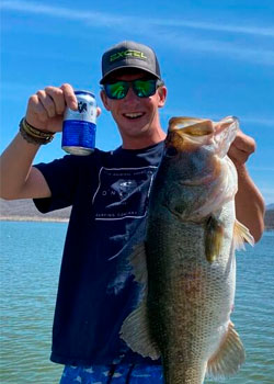 Angler with gorgeous black bass in lake picachos mazatlan sinaloa mexico